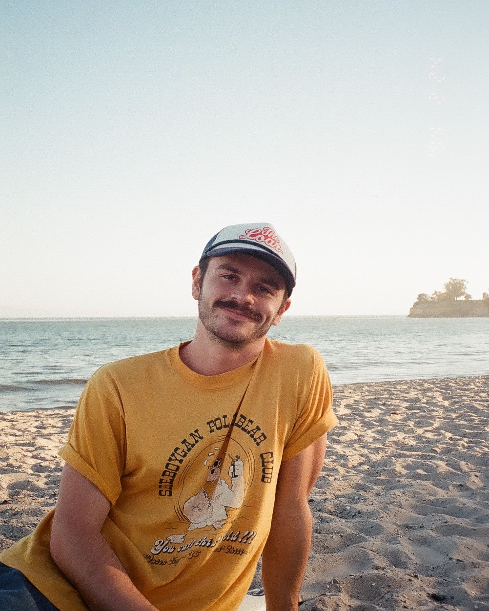 Bernard Hefner on the beach